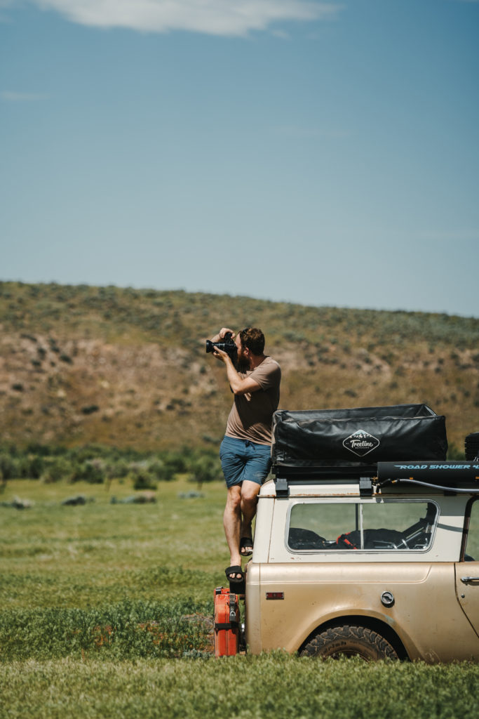 Shaun taking photo on back of Scout