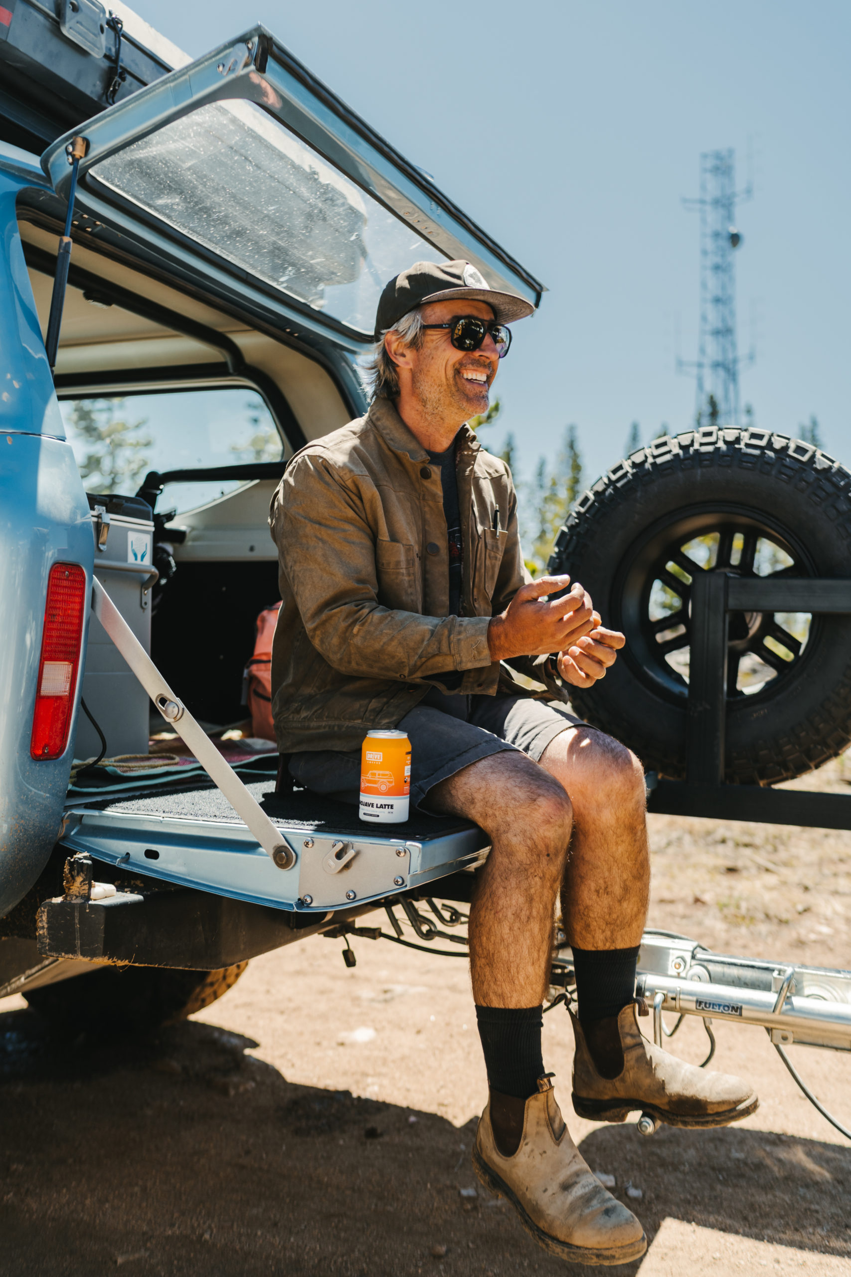 Sean sitting on Scout II tailgate